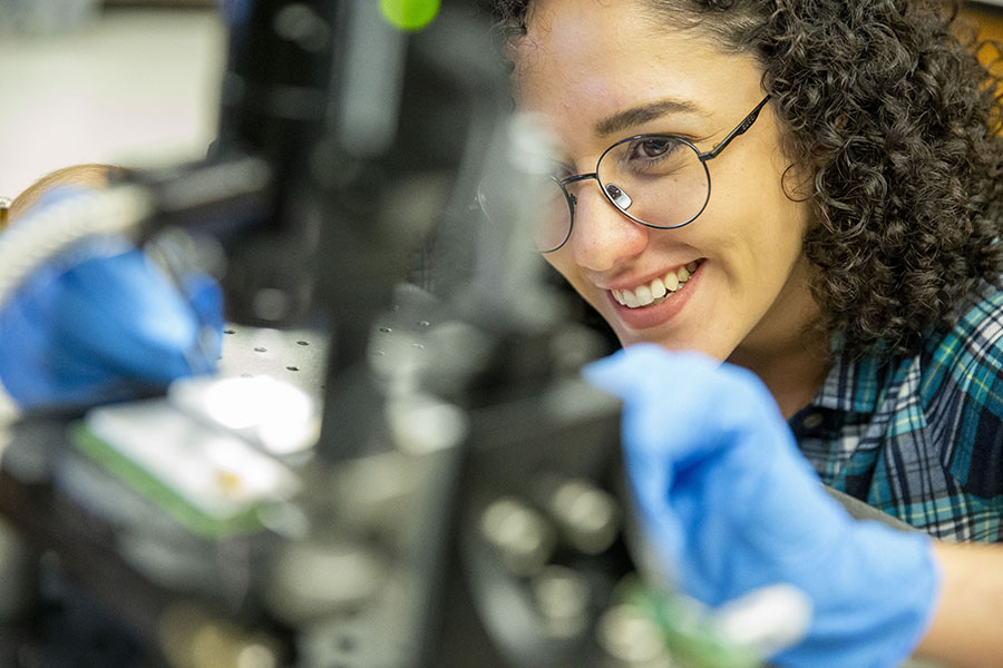 student works in physics lab