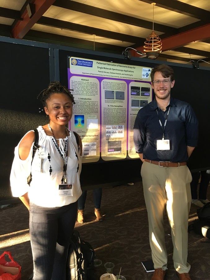 student and advisor at poster session