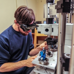 Student using a microscope